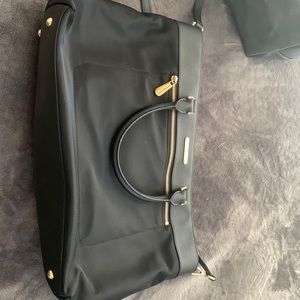 Large 3 section black with gold Michael Korea bag
